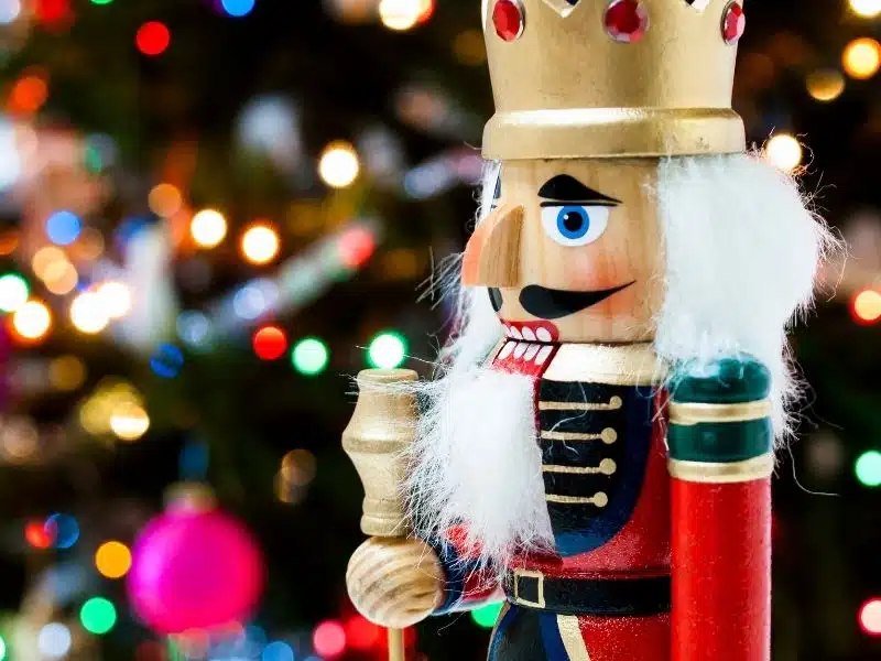 Nutcracker in front of tree